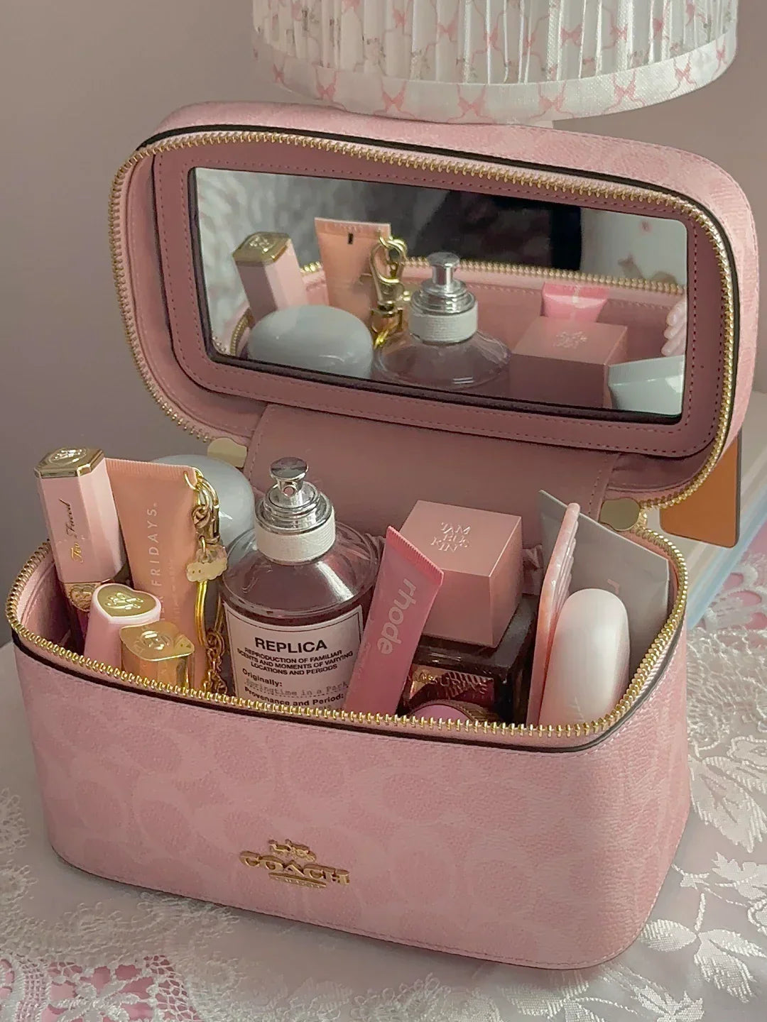 Signature Coach Cosmetics Bag.